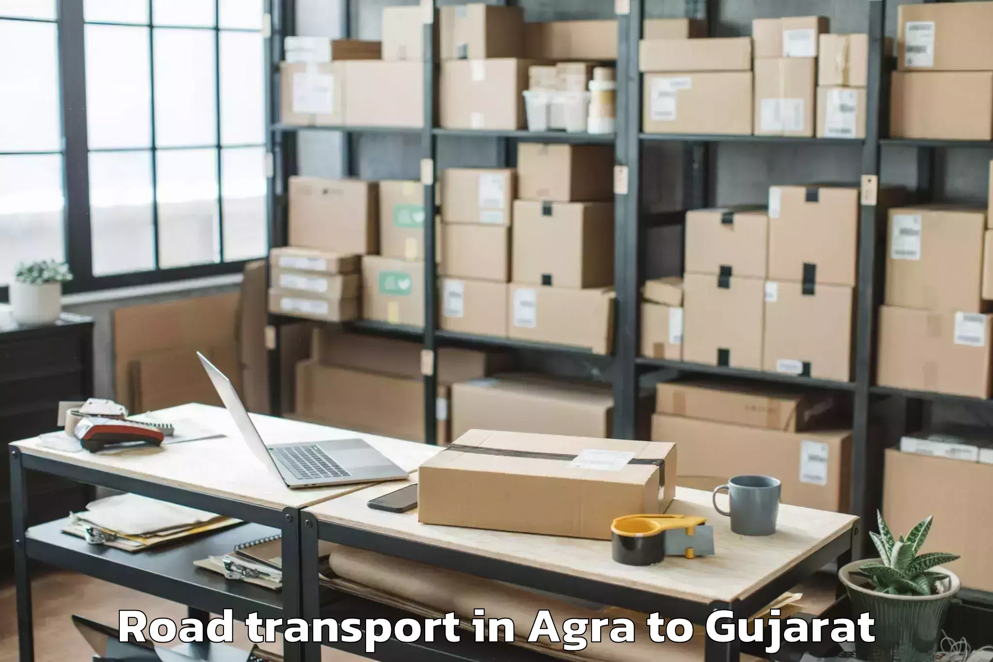 Easy Agra to Karjan Road Transport Booking